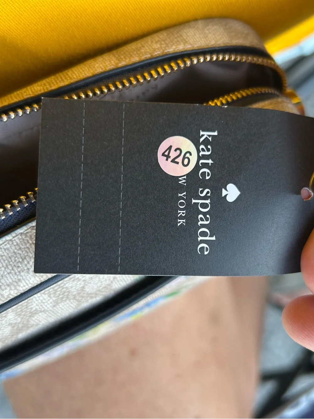 kate spade beige logo-lined handbag interior